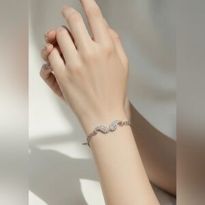 Angel wings cuz and silver bracelet